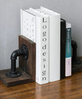 Legit Industrial Bookends Featuring Charred Pine And Genuine Metal Pipe Fittings And Badass 2 Piece Set for holding books on a desk.