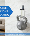 Built Different Matte Black Wall Mount Towel And Coat Hooks, Heavy Duty Aluminum Alloy Hat Racks With Smooth Non Skid Rings, Rust Free Bathroom Hardware, Top Shelf Durable Finish For Closets And Entries, Includes Four Pieces with a kettlebell weighing 15KG hanging.