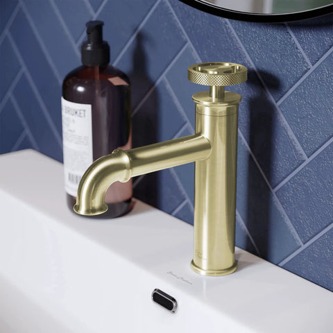 Brushed Gold Single Hole Bathroom Faucet With One Hand Control Solid Brass Durability 1.2 GPM Flow installed on vanity