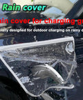 Keep Your EV Port Dry As A Bone With This Hella Tough Magnetic Cover Featuring Waterproof All Season Shield Clear Fit For Steel Bodied Electric Rides In Clean White Finish, rain cover protecting EV charger in rain.