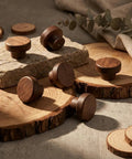 Top Shelf Mid Century Modern Walnut Mushroom Cabinet Knobs Slick Round Drawer Pulls decorative knobs on wood slices.
