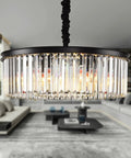 Modern Crystal Pendant Chandelier Two Tier Black Metal And Crystal Fixture in living room, showcasing elegance and shine