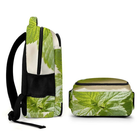 Side and bottom view of Green Mint Herb Printed Unisex Backpack with Large Capacity, showcasing mint leaf design and sturdy zippers.