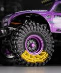 Close-up of silicone rubber inserts and S5 all-terrain tires for 1/18 TRX4M RC crawler with aggressive side lug grip