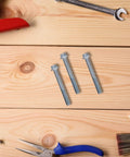Motorcycle Engine Mounting Screw Set 10 Pc Easy Install Hardware Kit M6 Thread 8mm Diameter Silver Finish Durable Metal Fasteners for Pros Techs and DIYers silver bolts on wood surface