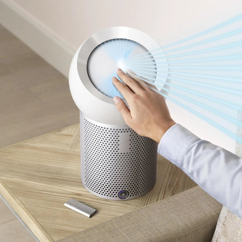 Person using 360 Degree Glass HEPA Air Purifier Filter For Pure Cool Me And Pure Cool Link Tower - Knocks Out 99.95 Percent Of Particles
