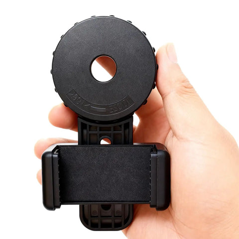 Hand holding Universal Binocular Phone Adapter With 360-Degree Rotation And Clip Lock High-Strength Clamp Fits 16-50mm Eyepieces