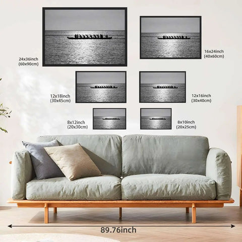 Rowing Team Silhouette Canvas Print With Black Frame, Modern Ocean Landscape Wall Art set above sofa in living room.