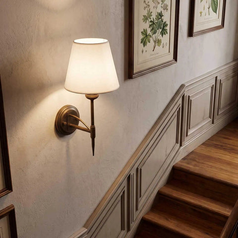 YS.ESUDSI Vintage Wall Sconces with White Fabric Shade Hardwired E26 Base mounted on a wall beside a staircase.