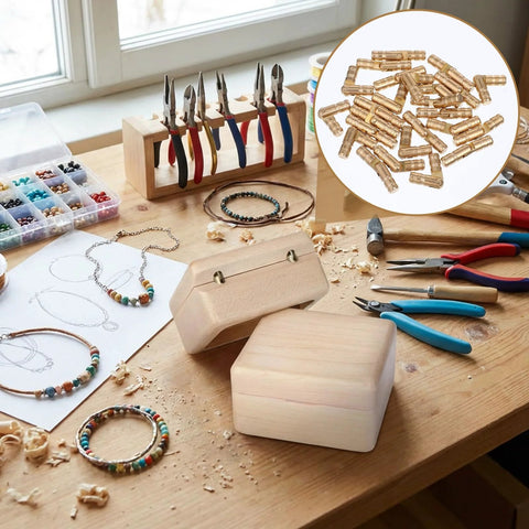 Invisible Brass Barrel Hinges 25 Pack, 20x4mm hidden for jewelry boxes and woodworking projects on a crafting table.