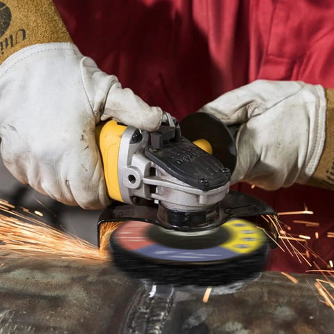 Worker using angle grinder with 10 Pack 4.5 Inch Strip Discs for Angle Grinder With Seven Eighths Inch Arbor on metal surface