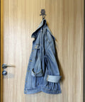 Set Of Two Cast Iron Owl Wall Hooks Super Heavy Duty Rustic Coat Rack Hangers Old School Vibe Built Like A Tank Sturdy As Nails To Hang Your Outerwear Inside with denim jacket on wooden door.