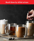 Four Piece Double Wall Insulated Glass Coffee Mug Set Keeps Hot Brews Steaming And Icy Drinks Frosty With Zero Sweat Marks Premium Borosilicate Glass Is Dishwasher Safe For Your Daily Grind Routine with hot and cold beverages.