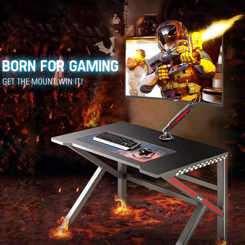 Single Gaming Monitor Arm With Mechanical Spring Load, fully adjustable for up to 32 inch screen mounted on gaming desk.