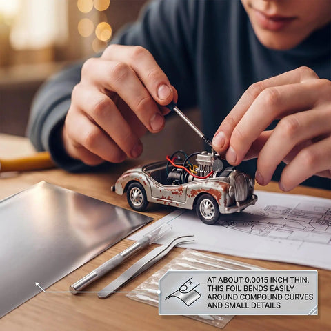 Person using Mirror Chrome Aluminum Foil For Model Cars And Aircraft 2 Pack Bare Metal Sheets 6 x 11.75 Inches with tools