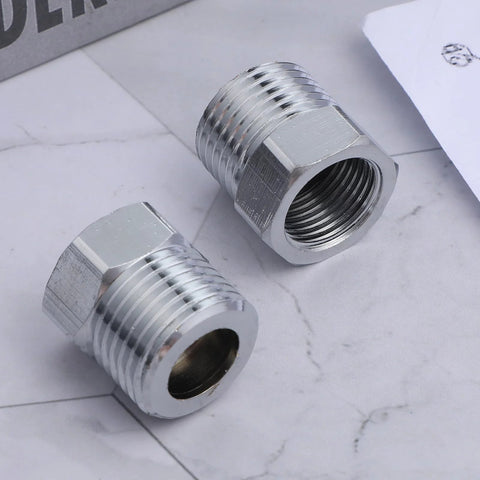 Two chrome-plated 1/2 G male to 3/8 compression female pipe fittings for faucet supply lines