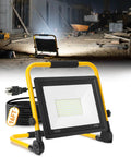 Ultra Bright 12000 Lumen LED Work Light with 128 LEDs, 16.4 ft cord, IP66 waterproof, shown on construction site.