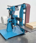 Heavy Duty 1100W Brushless Grinder And Polisher Belt Sander With Adjustable Speed Control Up To 5000 Rpm on workbench.