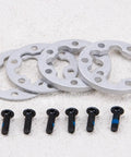 4 Pcs Aluminum E Bike Disc Brake Spacer Kit 6 Hole Universal Rotor Washers 2mm and 5mm with screws on a surface