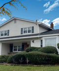 House with Durable Solar Panel for SimpliSafe Outdoor Camera Series 2 on roof and 13 ft cable running down wall