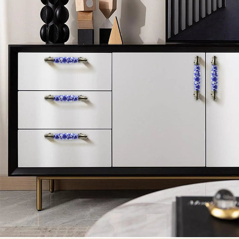 Vintage Blue Floral Ceramic Cabinet Pulls With Bronze Base Set Of 8 3.78 Inch Center Hole Drawer Handles installed on dresser