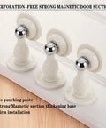 Heavy Duty Magnetic Door Stopper 2 Pack With Peel And Stick Adhesive Silicone Wall Protector No Drill Floor Catch For Renters And Home Office White Pro Move Design, showing three door stoppers on a wooden surface.