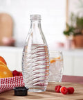 Glass Carbonating Carafe For Aqua Fizz Machines Eco Friendly 24 Oz Reusable Sparkling Water Bottle on kitchen table