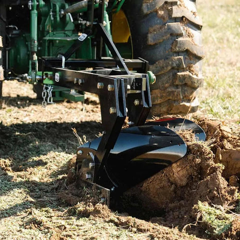 Three Point 21 Inch Double Moldboard Turn Plow For Category 1 Tractors in action, turning soil for aeration and residue breakdown.