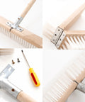 Close-up of Heavy Duty Push Broom With Rock Solid Four Layer Stiff Plastic Bristles and a wooden handle, showcasing bristles and construction details.