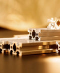 Close-up of aluminum extrusions without Ten Pack EU Standard T Slot End Caps for Aluminum Extrusion 7mm Diameter 20x20mm Silver Quick Fit Pro Grade
