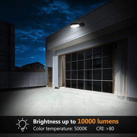 Two Pack 100W LED Barn Light With Dusk To Dawn Sensor illuminating a driveway at night, showing 5000K daylight color temperature.