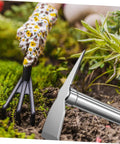 Stainless Steel Garden Hoe For Weeding And Planting Handy All Purpose Hand Hoe Tool With Sturdy Handle in use in a garden