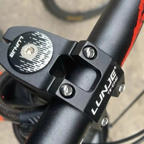 Close-up of black LUNJE bike stem attached to handlebars, compatible with Beefy Aluminum Bike Stem 25.4mm Or 31.8mm Handlebar Fit.