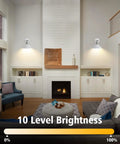 Set Of Two Battery Operated Wall Sconces With Remote Control illuminating a modern living room, wireless lighting above fireplace.