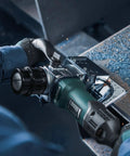 Five Eighths Inch Beveling Tool With Variable Speed And One Touch Depth Control used on metal edge in workshop