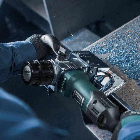 Five Eighths Inch Beveling Tool With Variable Speed And One Touch Depth Control used on metal edge in workshop