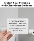 Do Not Flush Sign For Bathrooms White Acrylic Five By Three Point Five Inches held by a hand, with toilet background.