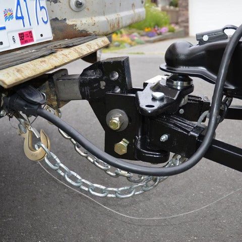 Close-up of 4Pack 3/8 Inch Clevis Slip Hooks With Latch Heavy Duty Forged Steel Safety Hooks attached to trailer hitch