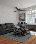 Odessa EnduraWall 3D Decorative Wall Panels 19 5 8 In W X 19 5 8 In H White installed in modern living room with black sofa and rug