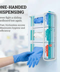 Hella Handy Wall Mount Glove And Tissue Wire Rack Dispenser That Holds Up To Three Boxes in use showing one-handed dispensing