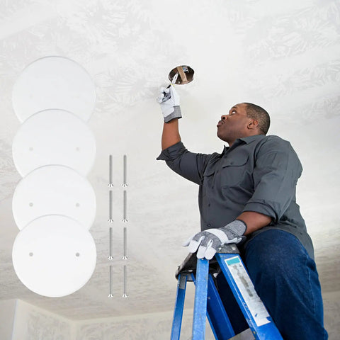 Man installing 4 pack 5 inch metal ceiling cover plates round white flat blank wall plate with screws 3.5 inch hole spacing