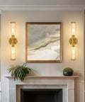 Battery Operated Wireless Wall Sconces With Remote 2 Pack Gold Dimmable Glass Wall Lights installed above fireplace