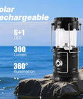 Collapsible Solar Camping Lantern With USB Rechargeable LED Flashlight on rocky beach with 6+1 LED, 300 lumen, 360-degree illumination