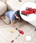 Child playing with 4.72 Inch Miniature Pickup Truck Model Alloy Metal Figurine For Collectors Who Dig on carpet road layout