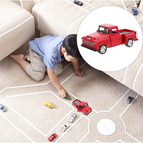 Child playing with 4.72 Inch Miniature Pickup Truck Model Alloy Metal Figurine For Collectors Who Dig on carpet road layout