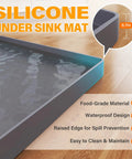 Waterproof Under Sink Mat 34x22 Inches Flexible Silicone Drip Tray For Kitchen And Bathroom Cabinets with raised edges.