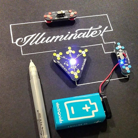 Conductive Ink Pen For DIY Circuits With Silver Ink, non-toxic, writes on paper with illuminated circuits and battery setup.