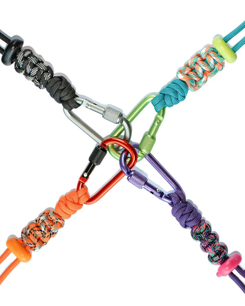 Close-up of a Tactical Paracord Gear Tether 2 Pack With Anti Loss Screw Lock Carabiner in various colors for backpacks and keys.