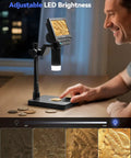 4.3 Inch Digital Coin Microscope with Built In Scale and Illuminated Magnifier in use by a person on a desk, showing LED brightness settings.