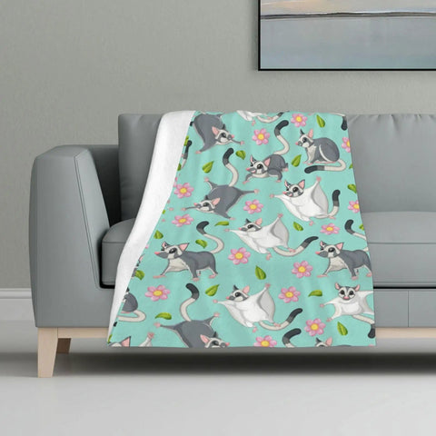 Super Cute Sugar Glider Throw Blanket For Kids And Girls, Hella Soft Weightless Plush Blend on couch with playful design.
